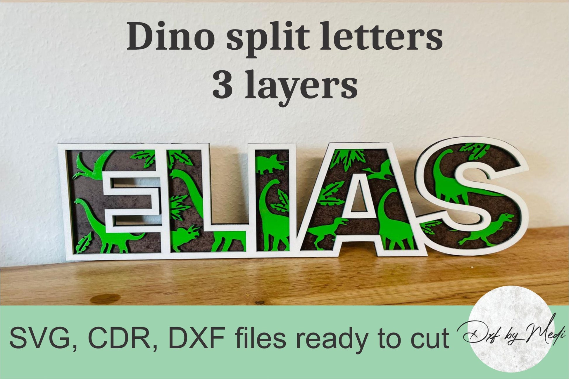 Wooden letters spelling 'ELIAS' with dinosaur designs on a wooden surface.